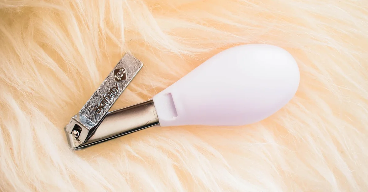 A nail clipper designed for small pets, specifically for mice.