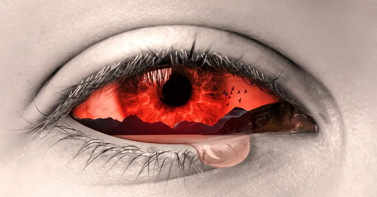 Close-up stylized image of an eye with a bright red iris, representing porphyrin staining (red tears) for educational identification in mice.